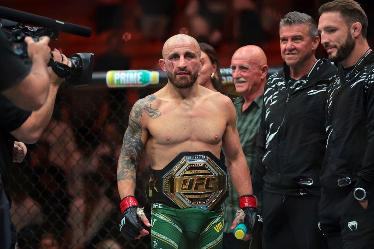 Apr 12, 2025; Miami, Florida, UNITED STATES; Alexander Volkanovski (red gloves) reacts after defeating Diego Lopes (not pictured) during UFC 314 at Kaseya Center. Mandatory Credit: Sam Navarro-Imagn Images