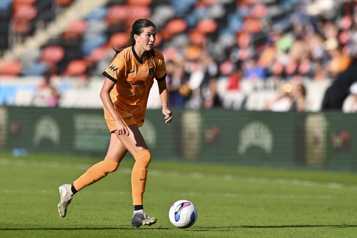 Apr 12, 2025; Houston, Texas, USA; Houston Dash midfielder Maggie Graham (23) controls the ball during the second half against the Angel City FC at Shell Energy Stadium. Mandatory Credit: Maria Lysaker-Imagn Images