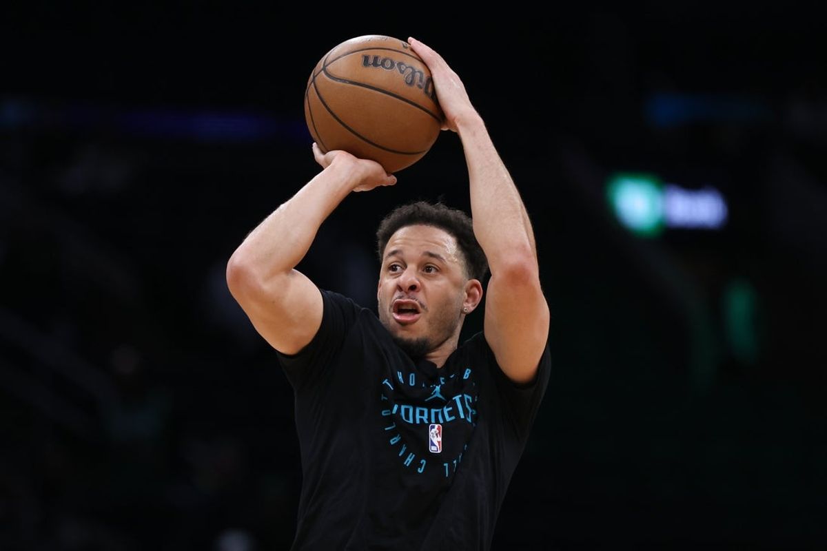 Apr 13, 2025; Boston, Massachusetts, USA; Charlotte Hornets guard Seth Curry (30) shoots during warm ups before a game against the Boston Celtics at TD Garden. Mandatory Credit: Paul Rutherford-Imagn Images