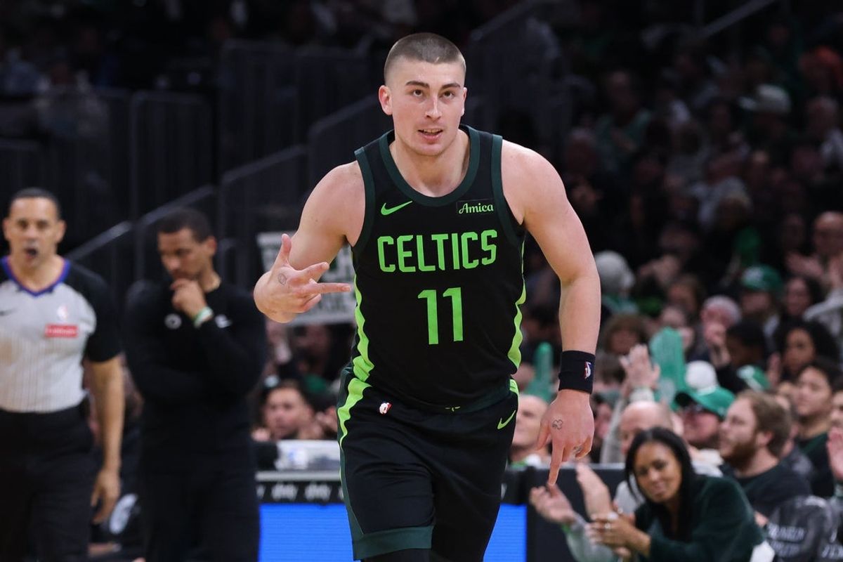 Apr 13, 2025; Boston, Massachusetts, USA; Boston Celtics guard Payton Pritchard (11) reacts after making a there pointer during the second half against the Charlotte Hornets at TD Garden. Mandatory Credit: Paul Rutherford-Imagn Images