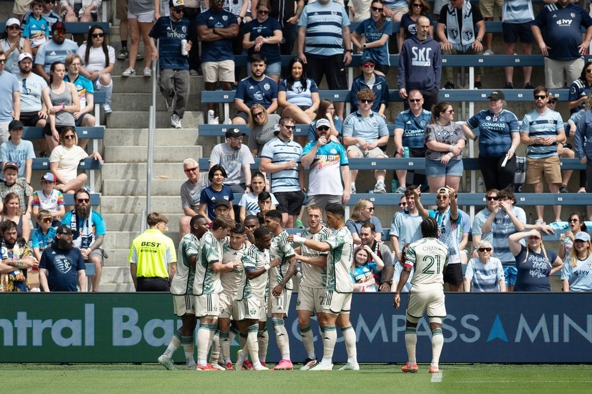 Apr 13, 2025; Kansas City, Kansas, USA;  Portland Timbers players celebrate after a goal by midfielder David Ayala (24) during the first half of the match against Sporting Kansas City at Children's Mercy Park. Mandatory Credit: Kylie Graham-Imagn Images