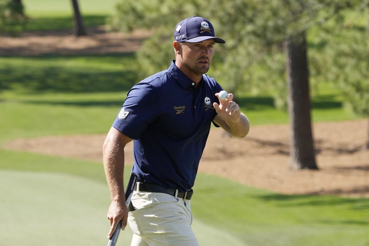 Apr 13, 2025; Augusta, Georgia, USA; Bryson DeChambeau reacts after putting on the seventh green during the final round of the Masters Tournament at Augusta National Golf Club. Mandatory Credit: Michael Madrid-Imagn Images