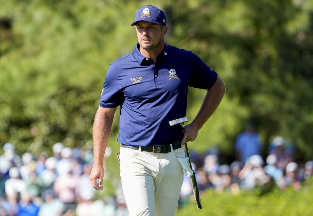 Apr 13, 2025; Augusta, Georgia, USA; Bryson DeChambeau reacts after his putt on no. 10 during the final round of the Masters Tournament at Augusta National Golf Club. Mandatory Credit: Kyle Terada-Imagn Images