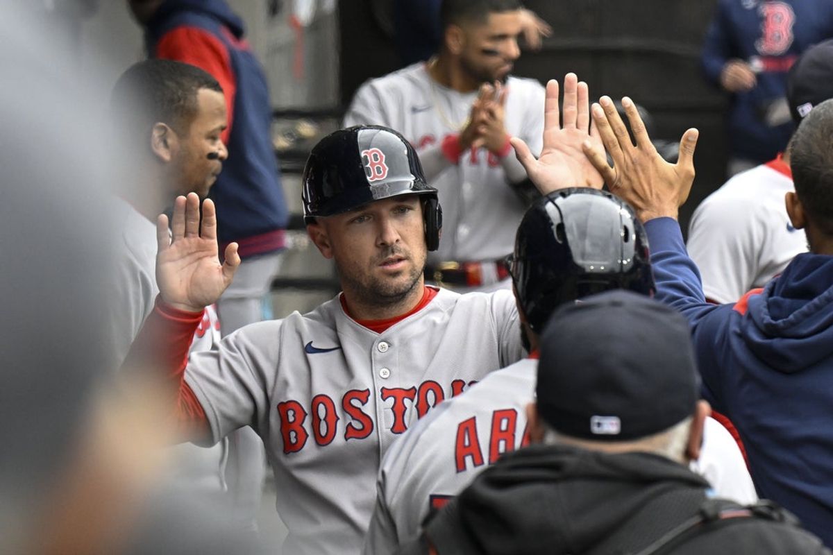 Apr 13, 2025; Chicago, Illinois, USA;  Boston Red Sox third baseman Alex Bregman (2) celebrates after scoring against the Chicago White Sox during the sixth inning at Guaranteed Rate Field. Mandatory Credit: Matt Marton-Imagn Images