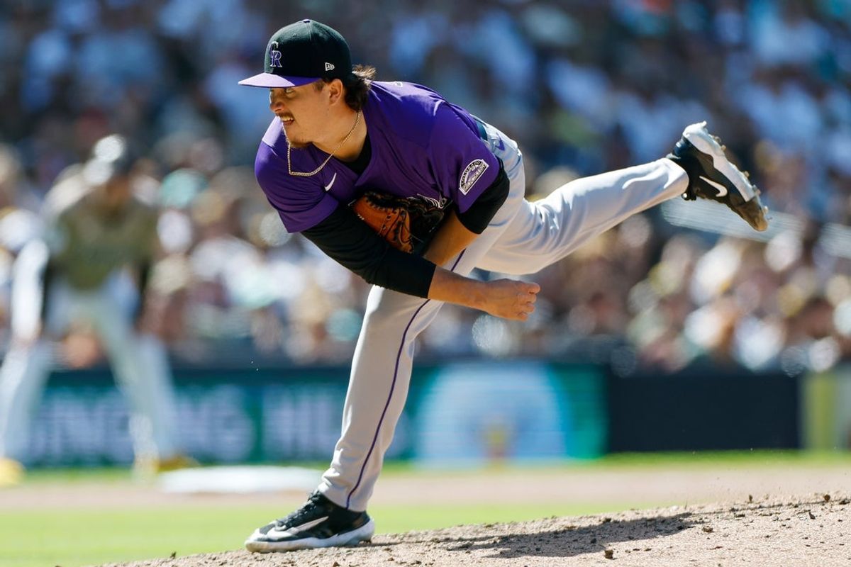 Apr 13, 2025; San Diego, California, USA; Colorado Rockies relief pitcher Victor Vodnik (38) throws a pitch during the eighth inning against the San Diego Padres at Petco Park. Mandatory Credit: David Frerker-Imagn Images