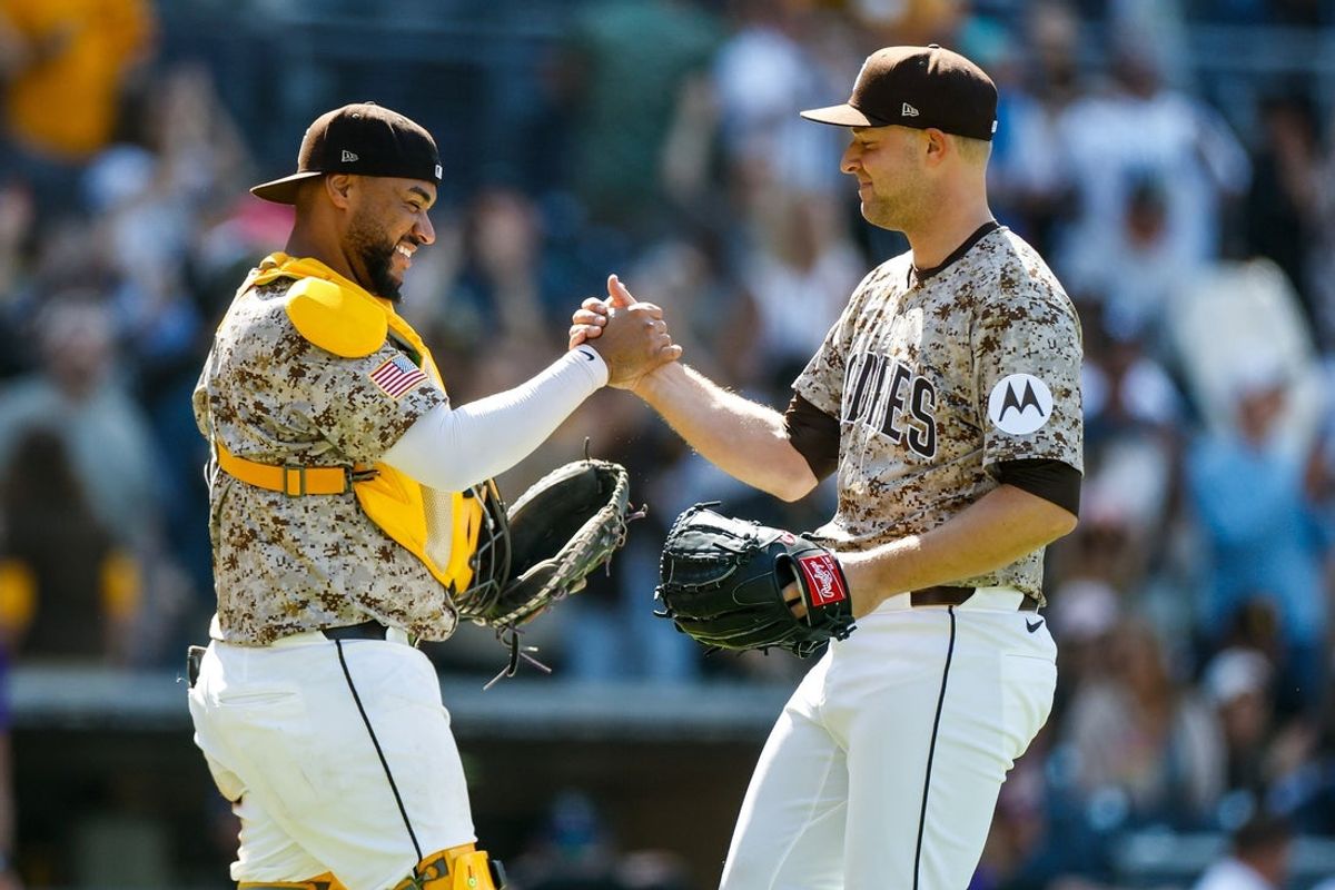 Apr 13, 2025; San Diego, California, USA; San Diego Padres starting pitcher Michael King (34) celebrates with San Diego Padres catcher Elias Diaz (17) after throwing a complete-game two hit shutout against the Colorado Rockies at Petco Park. Mandatory Credit: David Frerker-Imagn Images