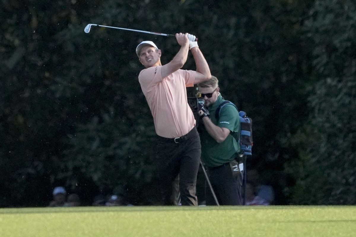 Apr 13, 2025; Augusta, Georgia, USA; Justin Rose plays his fairway shot on no. 18 in a playoff during the final round of the Masters Tournament at Augusta National Golf Club. Mandatory Credit: Kyle Terada-Imagn Images
