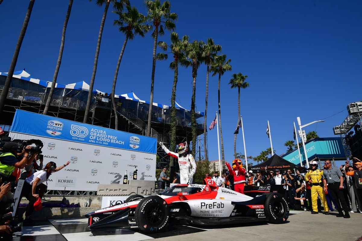 Apr 13, 2025; Long Beach, California, USA; Andretti Global driver Kyle Kirkwood (27) celebrates his victory of the Long Beach Grand Prix at Long Beach street circuit. Mandatory Credit: Gary A. Vasquez-Imagn Images