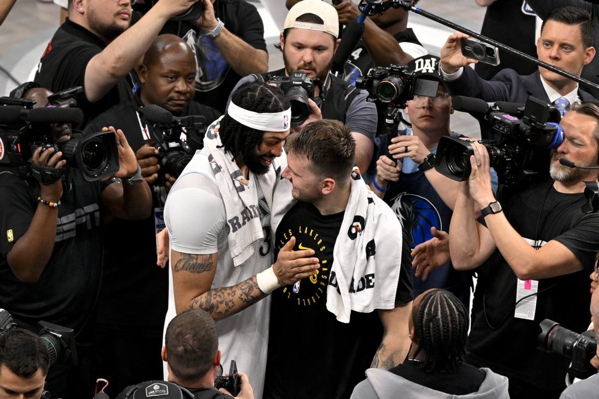 Apr 9, 2025; Dallas, Texas, USA; Los Angeles Lakers guard Luka Doncic (77) and Dallas Mavericks forward Anthony Davis (3) after the game between the Dallas Mavericks and the Los Angeles Lakers at American Airlines Center. Mandatory Credit: Jerome Miron-Imagn Images