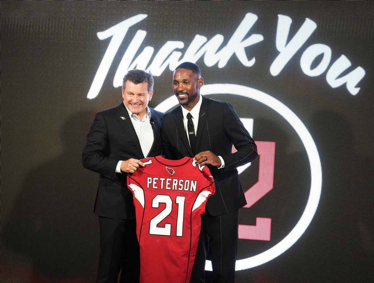 Arizona Cardinals president Michael Bidwill with former Cardinals star cornerback Patrick Peterson during his retirement news conference at the Cardinals' Tempe facility on April 14, 2025.