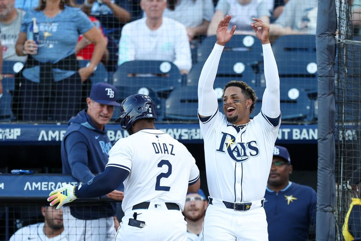 Apr 14, 2025; Tampa, Florida, USA; Tampa Bay Rays designated hitter Yandy Diaz (2) celebrates with left fielder Christopher Morel (24) after hitting a home run against the Boston Red Sox in the first inning at George M. Steinbrenner Field. Mandatory Credit: Nathan Ray Seebeck-Imagn Images