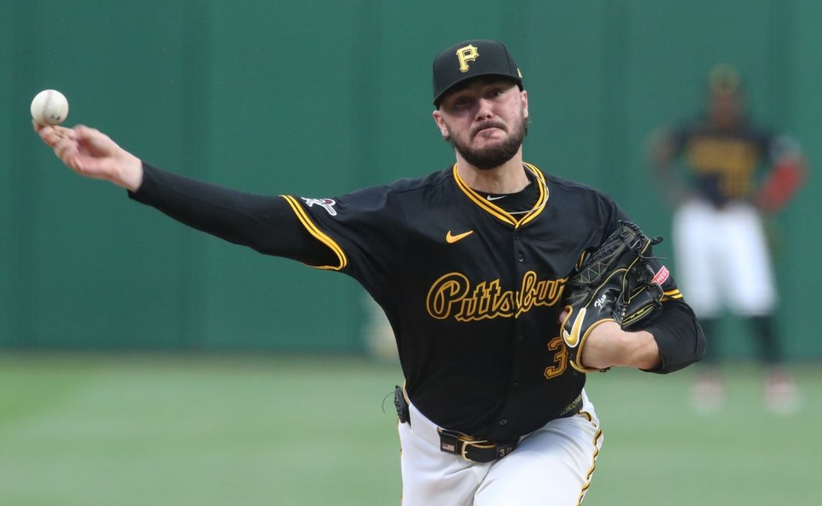Apr 14, 2025; Pittsburgh, Pennsylvania, USA;  Pittsburgh Pirates starting pitcher Paul Skenes (30) delivers a pitch against the Washington Nationals during the first inning at PNC Park. Mandatory Credit: Charles LeClaire-Imagn Images