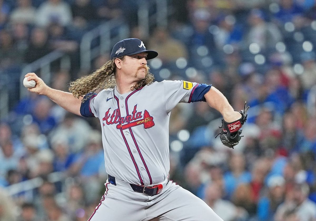 Apr 14, 2025; Toronto, Ontario, CAN; Atlanta Braves starting pitcher Grant Holmes (66) throws a pitch against the Toronto Blue Jays during the first inning at Rogers Centre. Mandatory Credit: Nick Turchiaro-Imagn Images
