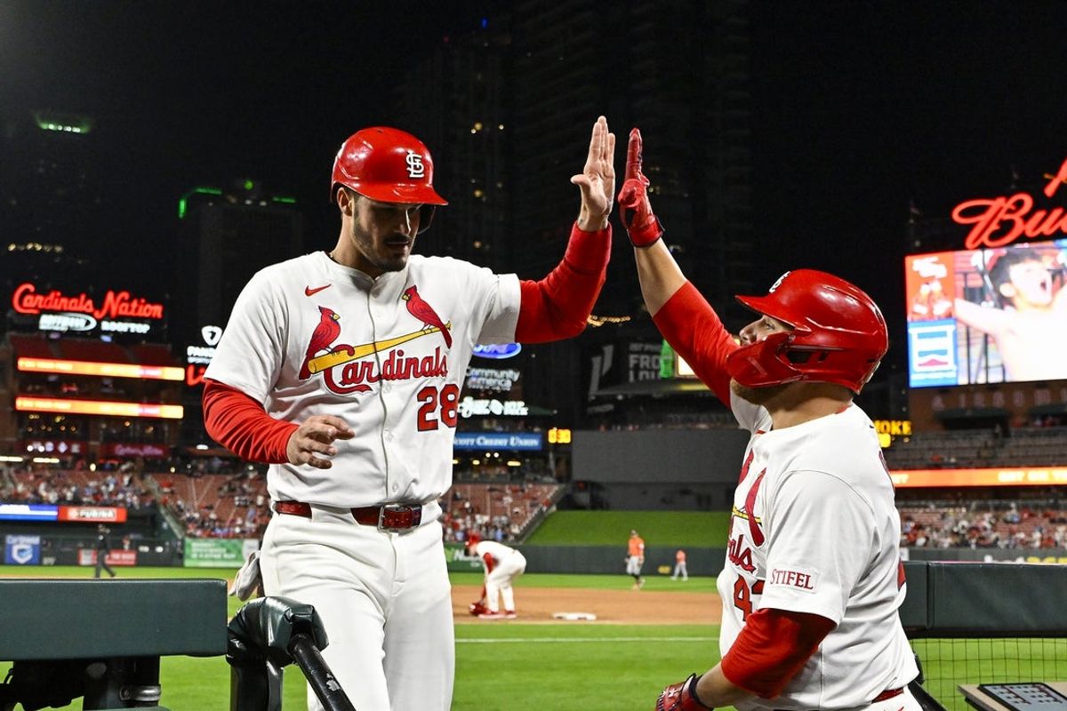 Apr 14, 2025; St. Louis, Missouri, USA;  St. Louis Cardinals third baseman Nolan Arenado (28) is congratulated by catcher Pedro Pages (43) after scoring against the Houston Astros during the fifth inning at Busch Stadium. Mandatory Credit: Jeff Curry-Imagn Images