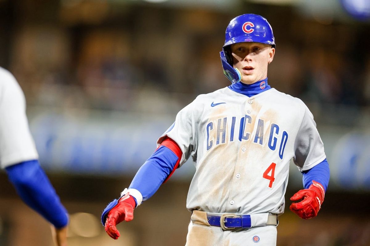 Apr 14, 2025; San Diego, California, USA;  Chicago Cubs center fielder Pete Crow-Armstrong (4) reacts after hitting a single during the sixth inning against the San Diego Padres at Petco Park. Mandatory Credit: David Frerker-Imagn Images
