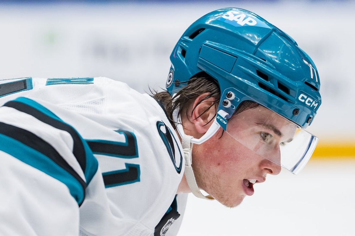 Apr 14, 2025; Vancouver, British Columbia, CAN; San Jose Sharks forward Macklin Celebrini (71) prepares for a face off against the Vancouver Canucks in overtime at Rogers Arena. Mandatory Credit: Bob Frid-Imagn Images