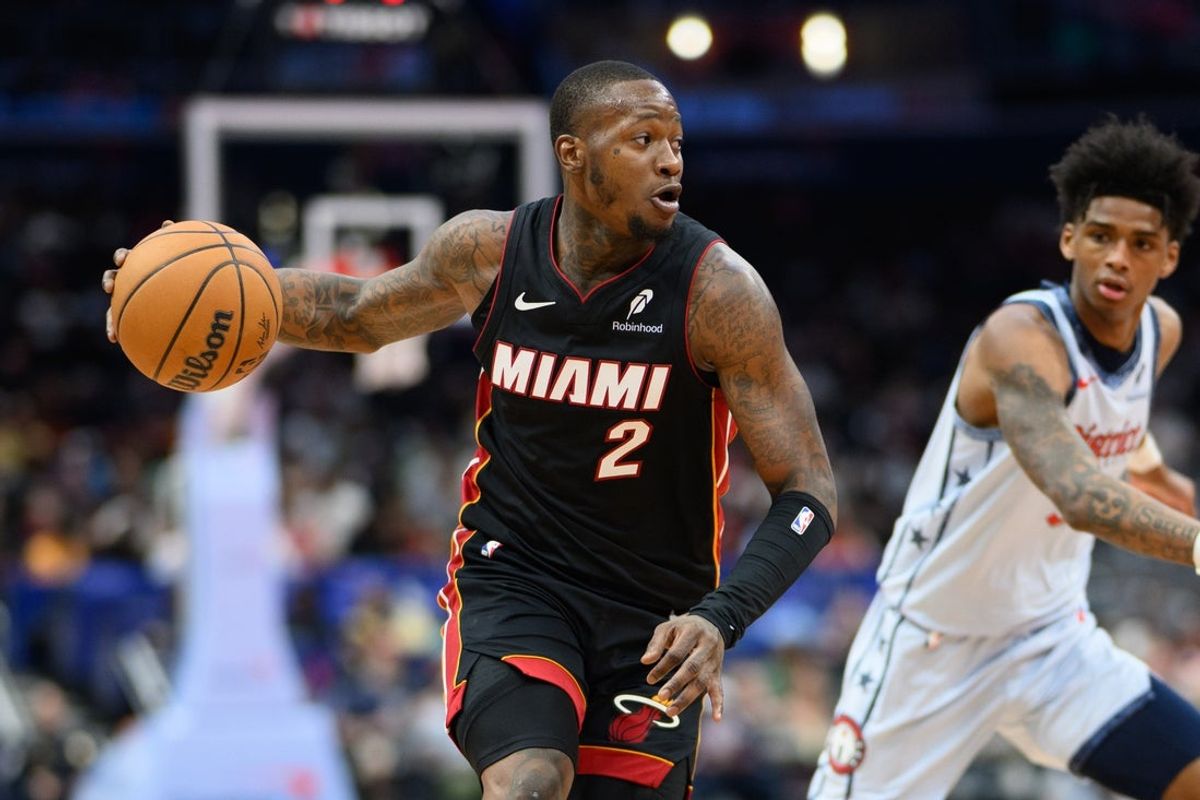 Mar 31, 2025; Washington, District of Columbia, USA; Miami Heat guard Terry Rozier (2) drives to the basket against Washington Wizards guard AJ Johnson (5) during the first quarter at Capital One Arena. Mandatory Credit: Reggie Hildred-Imagn Images