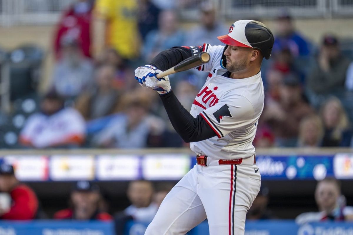 Apr 15, 2025; Minneapolis, Minnesota, USA; Minnesota Twins right fielder Matt Wallner (38) hits a single against the New York Mets in the first inning at Target Field. Mandatory Credit: Jesse Johnson-Imagn Images
