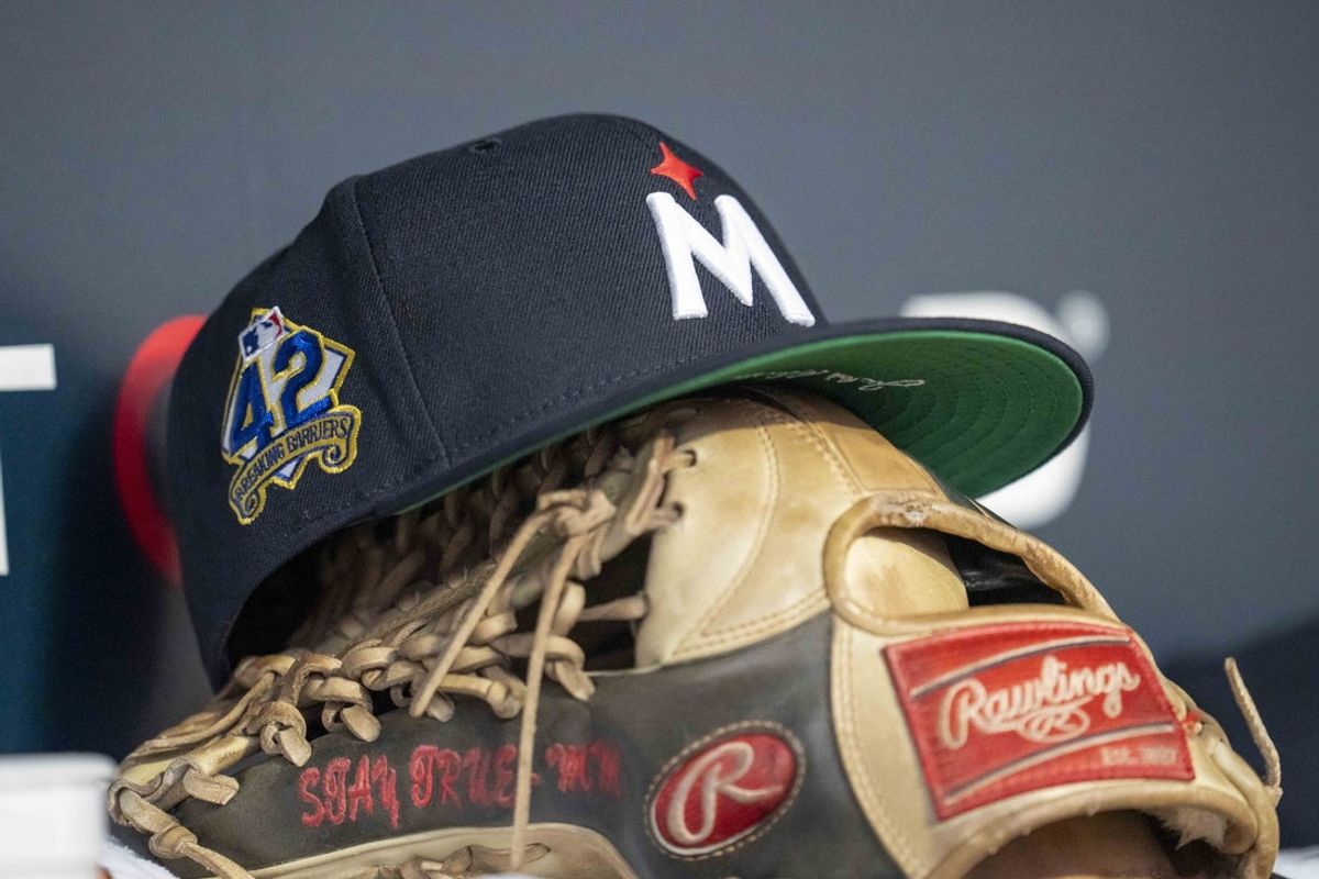 Apr 15, 2025; Minneapolis, Minnesota, USA; A general view of a Minnesota Twins hat with a Jackie Robinson logo stitched on the side of it against the New York Mets in the fourth inning at Target Field. All players wore #42 for Jackie Robinson Day Mandatory Credit: Jesse Johnson-Imagn Images