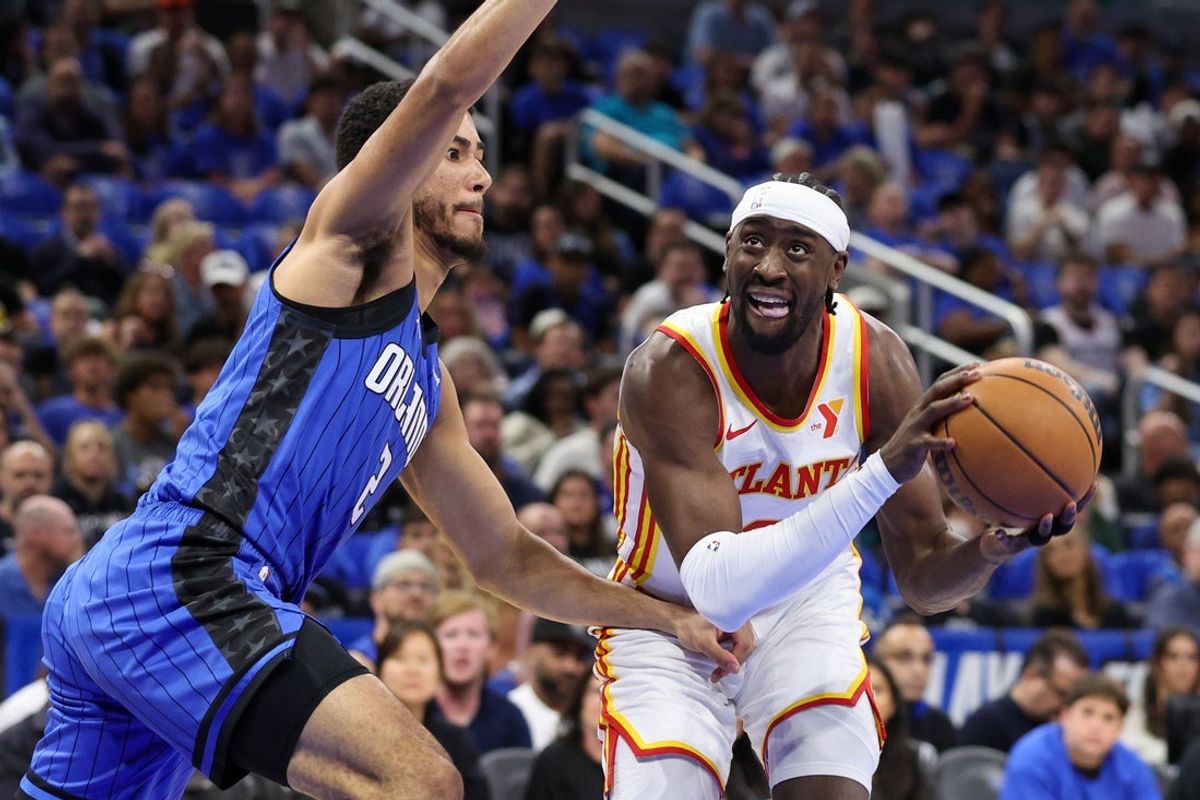 Apr 15, 2025; Orlando, Florida, USA; Orlando Magic guard Caleb Houstan (2) guards Atlanta Hawks guard Caris LeVert (3) in the first quarter at Kia Center. Mandatory Credit: Nathan Ray Seebeck-Imagn Images