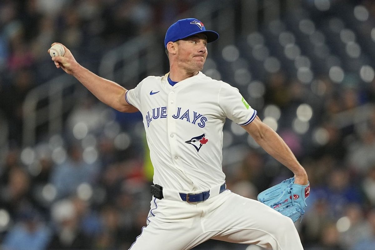 Apr 16, 2025; Toronto, Ontario, CAN; Toronto Blue Jays starting pitcher Chris Bassitt (40) pitches to the Atlanta Braves during the first inning at Rogers Centre. Mandatory Credit: John E. Sokolowski-Imagn Images