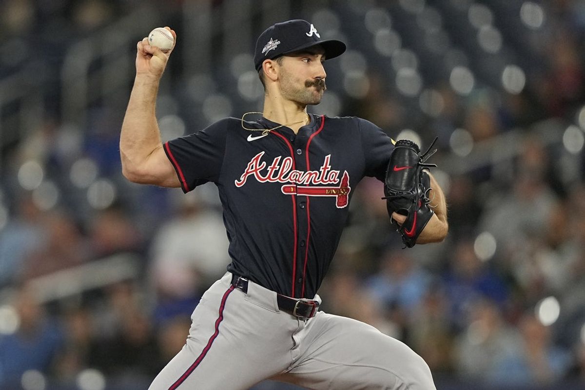 Apr 16, 2025; Toronto, Ontario, CAN; Atlanta Braves starting pitcher Spencer Strider (99) pitches to the Toronto Blue Jays during the first inning at Rogers Centre. Mandatory Credit: John E. Sokolowski-Imagn Images