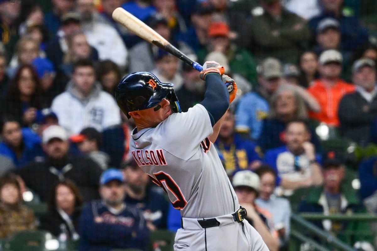 Apr 16, 2025; Milwaukee, Wisconsin, USA; Detroit Tigers first baseman Spencer Torkelson (20) hits a solo home run in the sixth inning against the Milwaukee Brewers at American Family Field. Mandatory Credit: Benny Sieu-Imagn Images