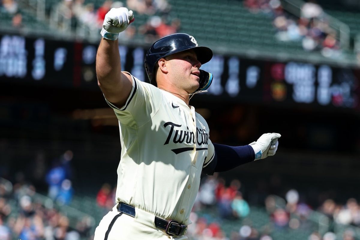 Apr 16, 2025; Minneapolis, Minnesota, USA; Minnesota Twins first baseman Ty France (13) celebrates his walk-off single against the New York Mets during the tenth inning at Target Field. Mandatory Credit: Matt Krohn-Imagn Images