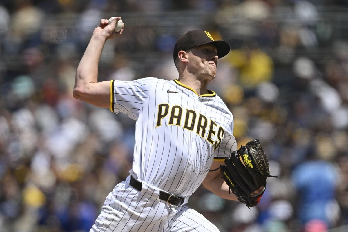 Apr 16, 2025; San Diego, California, USA; San Diego Padres starting pitcher Nick Pivetta (27) delivers during the second inning against the Chicago Cubs at Petco Park. Mandatory Credit: Denis Poroy-Imagn Images