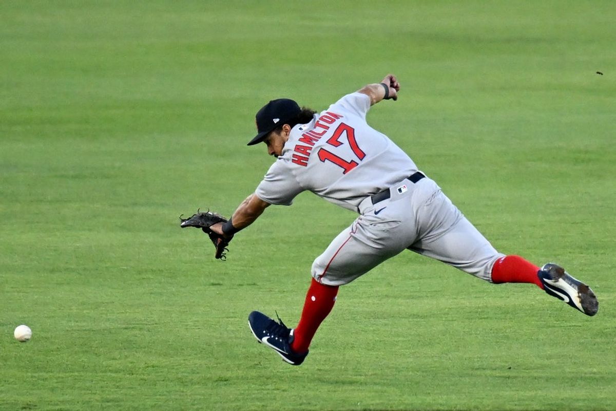 Apr 16, 2025; St. Petersburg, Florida, USA; Boston Red Sox second baseman David Hamilton (17) attempts to field a ground ball in the third inning against the Tampa Bay Rays at George M. Steinbrenner Field. Mandatory Credit: Jonathan Dyer-Imagn Images