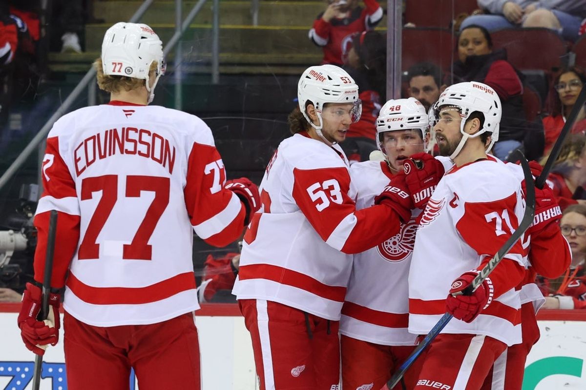 Apr 16, 2025; Newark, New Jersey, USA; Detroit Red Wings right wing Jonatan Berggren (48) celebrates his goal against the New Jersey Devils during the first period at Prudential Center. Mandatory Credit: Ed Mulholland-Imagn Images