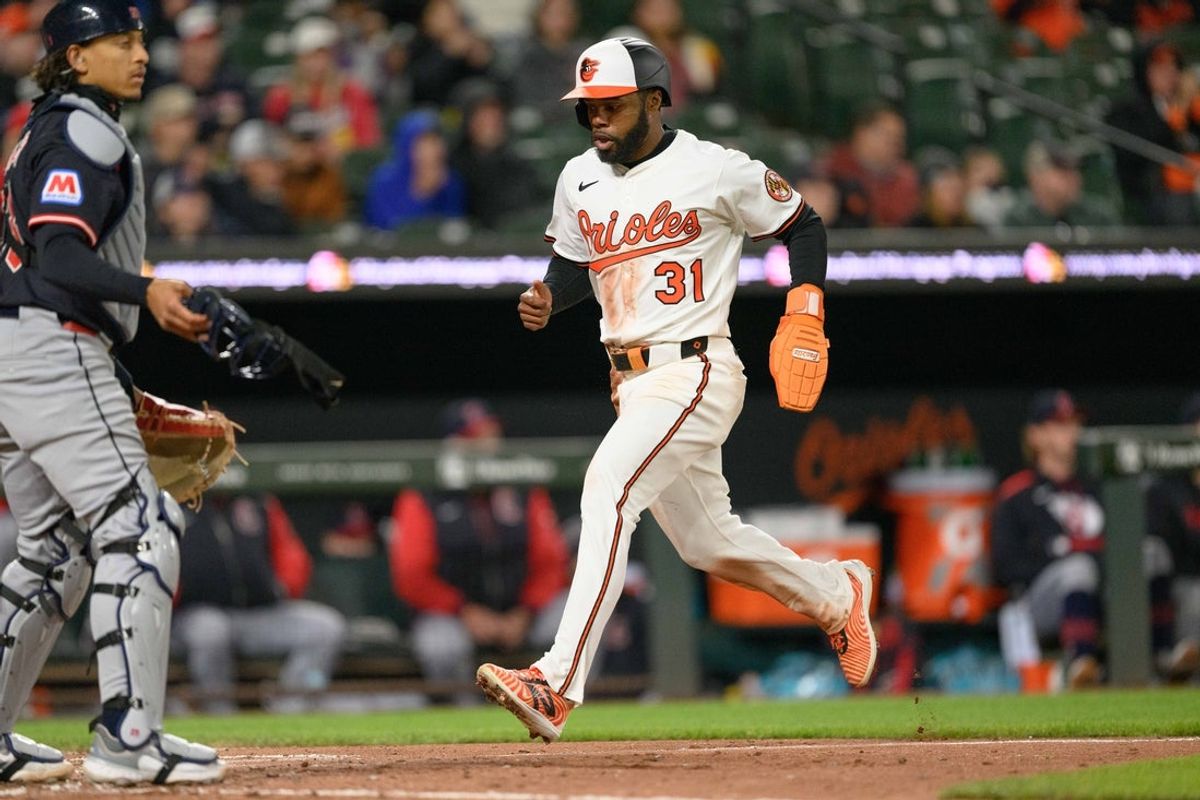 Apr 16, 2025; Baltimore, Maryland, USA; Baltimore Orioles outfielder Cedric Mullins (31) scores a run during the eighth inning against the Cleveland Guardians at Oriole Park at Camden Yards. Mandatory Credit: Reggie Hildred-Imagn Images