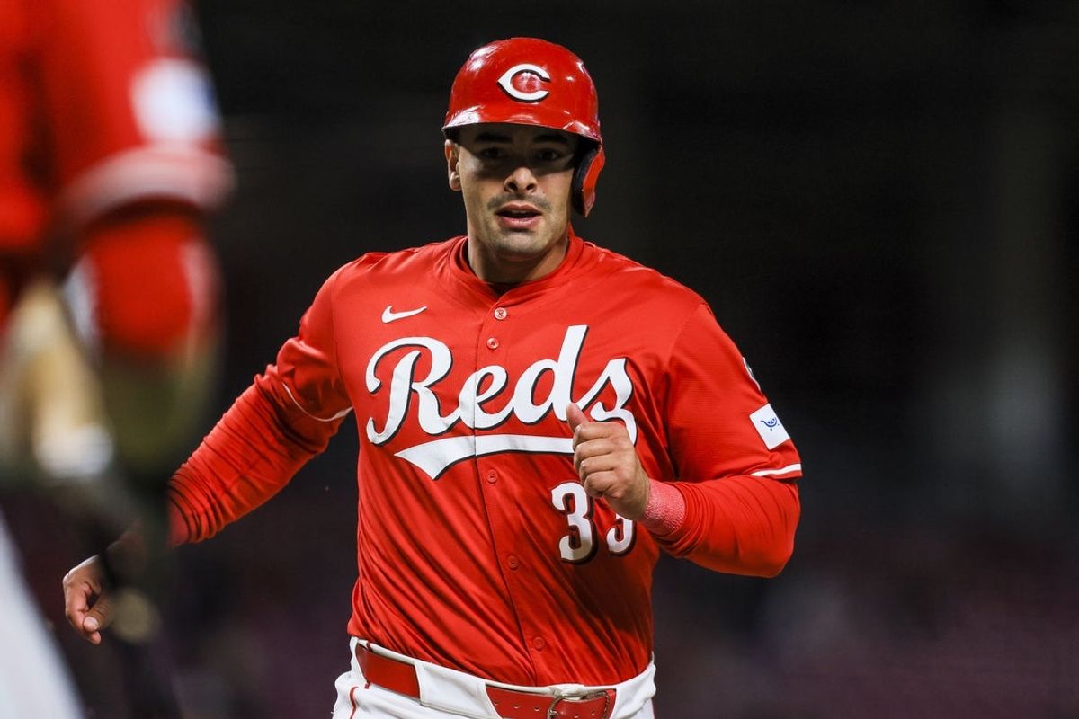 Apr 16, 2025; Cincinnati, Ohio, USA; Cincinnati Reds first baseman Christian Encarnacion-Strand (33) scores on a RBI single hit by catcher Jose Trevino (not pictured) in the seventh inning against the Seattle Mariners at Great American Ball Park. Mandatory Credit: Katie Stratman-Imagn Images