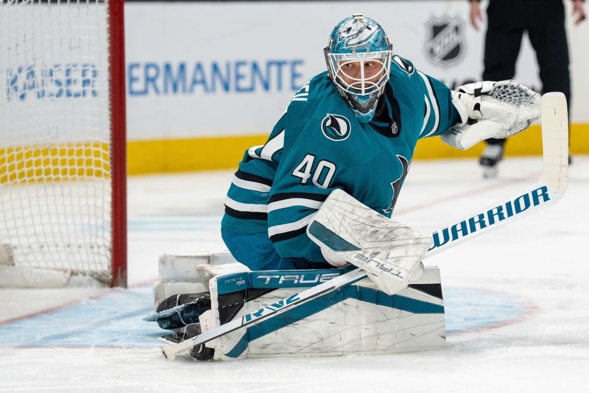Apr 16, 2025; San Jose, California, USA;  San Jose Sharks goaltender Alexandar Georgiev (40) reacts after the shot on goal against the Edmonton Oilers during the first period at SAP Center at San Jose. Mandatory Credit: Neville E. Guard-Imagn Images