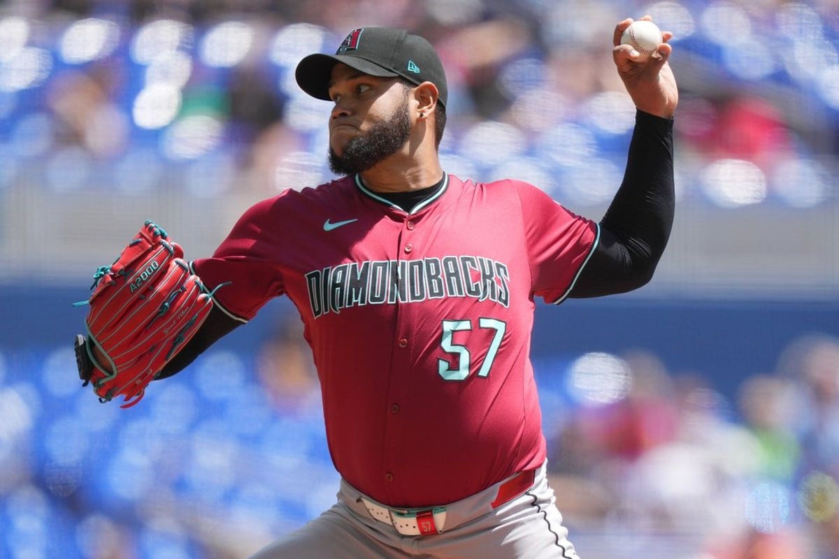 Apr 17, 2025; Miami, Florida, USA;  Arizona Diamondbacks pitcher Eduardo Rodriguez (57) pitches against the Miami Marlins in the first inning at loanDepot Park. Mandatory Credit: Jim Rassol-Imagn Images