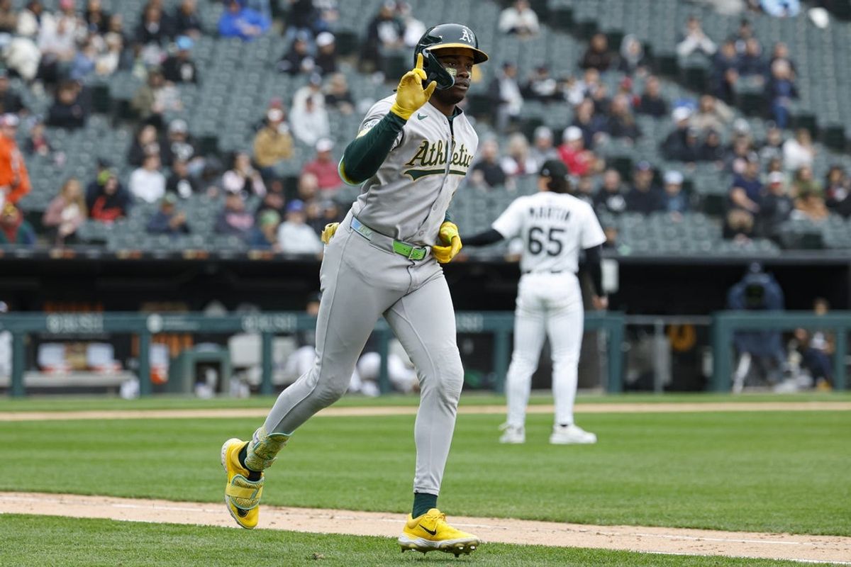Apr 17, 2025; Chicago, Illinois, USA; Athletics right fielder Lawrence Butler (4) rounds the bases after hitting a solo home run against the Chicago White Sox during the fifth inning at Rate Field. Mandatory Credit: Kamil Krzaczynski-Imagn Images