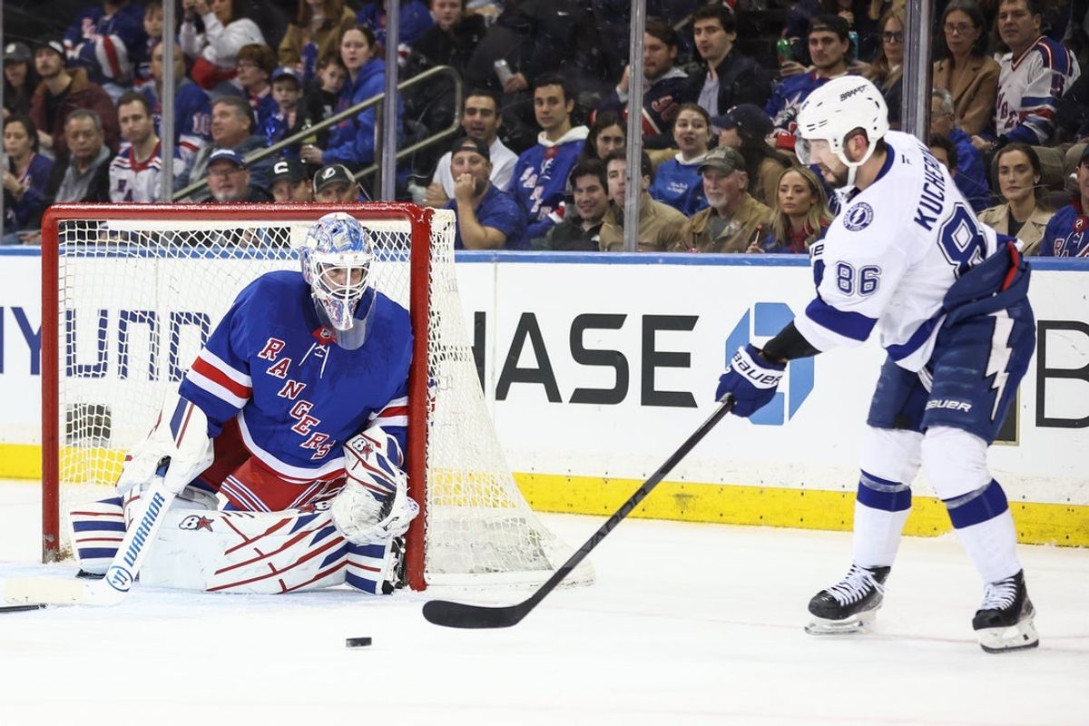 Apr 17, 2025; New York, New York, USA;  New York Rangers goaltender Igor Shesterkin (31) makes a save on a shot on goal attempt by Tampa Bay Lightning right wing Nikita Kucherov (86) in the second period at Madison Square Garden. Mandatory Credit: Wendell Cruz-Imagn Images