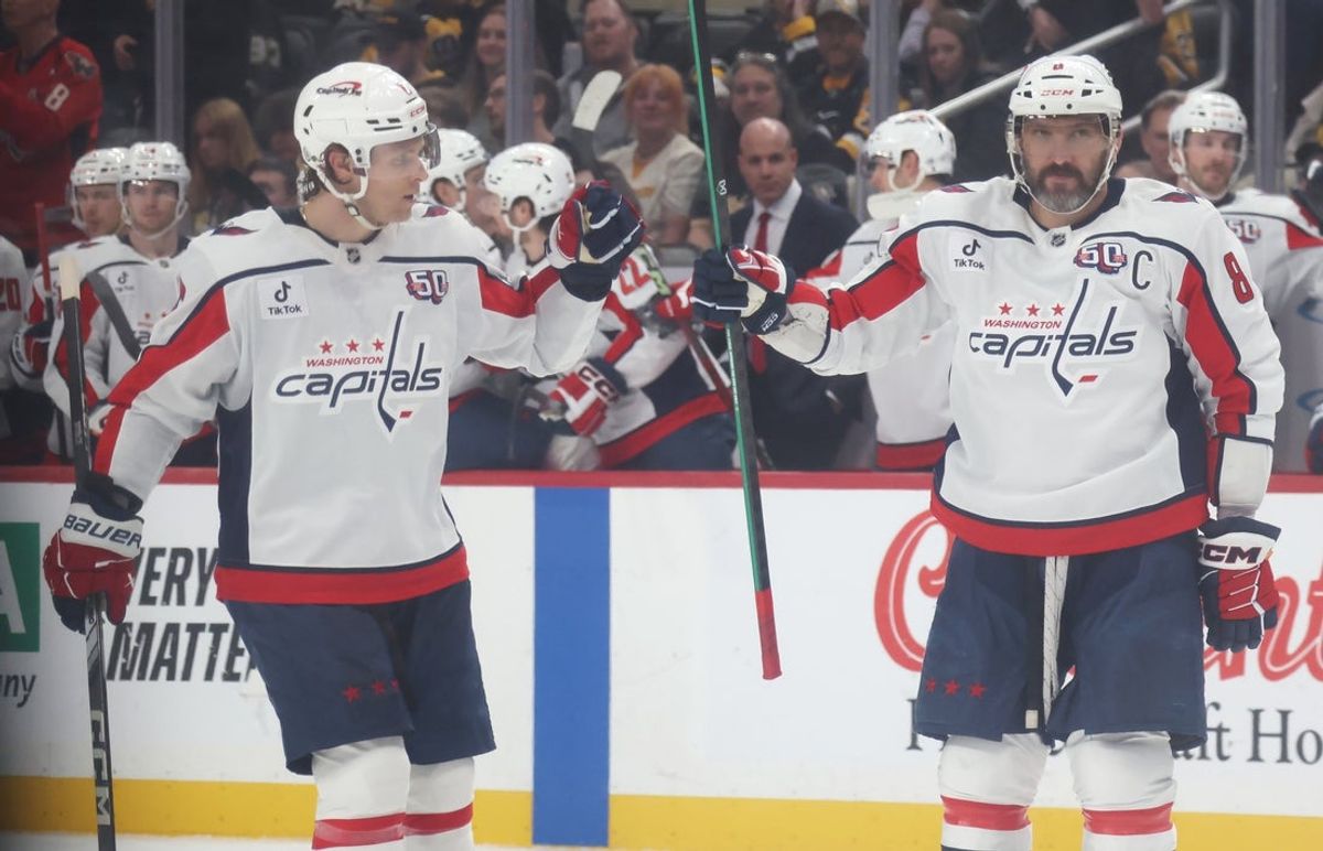 Apr 17, 2025; Pittsburgh, Pennsylvania, USA;  Washington Capitals defenseman Jakob Chychrun (6) congratulates left wing Alex Ovechkin (8) on his goal against the Pittsburgh Penguins during the second period at PPG Paints Arena. Mandatory Credit: Charles LeClaire-Imagn Images