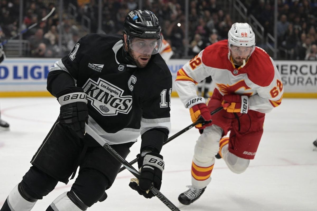 Apr 17, 2025; Los Angeles, California, USA;  Los Angeles Kings center Anze Kopitar (11) chases down the puck during the second period at Crypto.com Arena. Mandatory Credit: Jayne Kamin-Oncea-Imagn Images