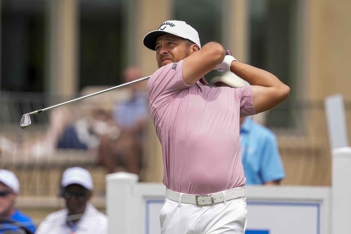 Apr 18, 2025; Hilton Head, South Carolina, USA; Xander Schauffele hits a tee shot on 17 during the second round of the RBC Heritage golf tournament. Mandatory Credit: Jim Dedmon-Imagn Images