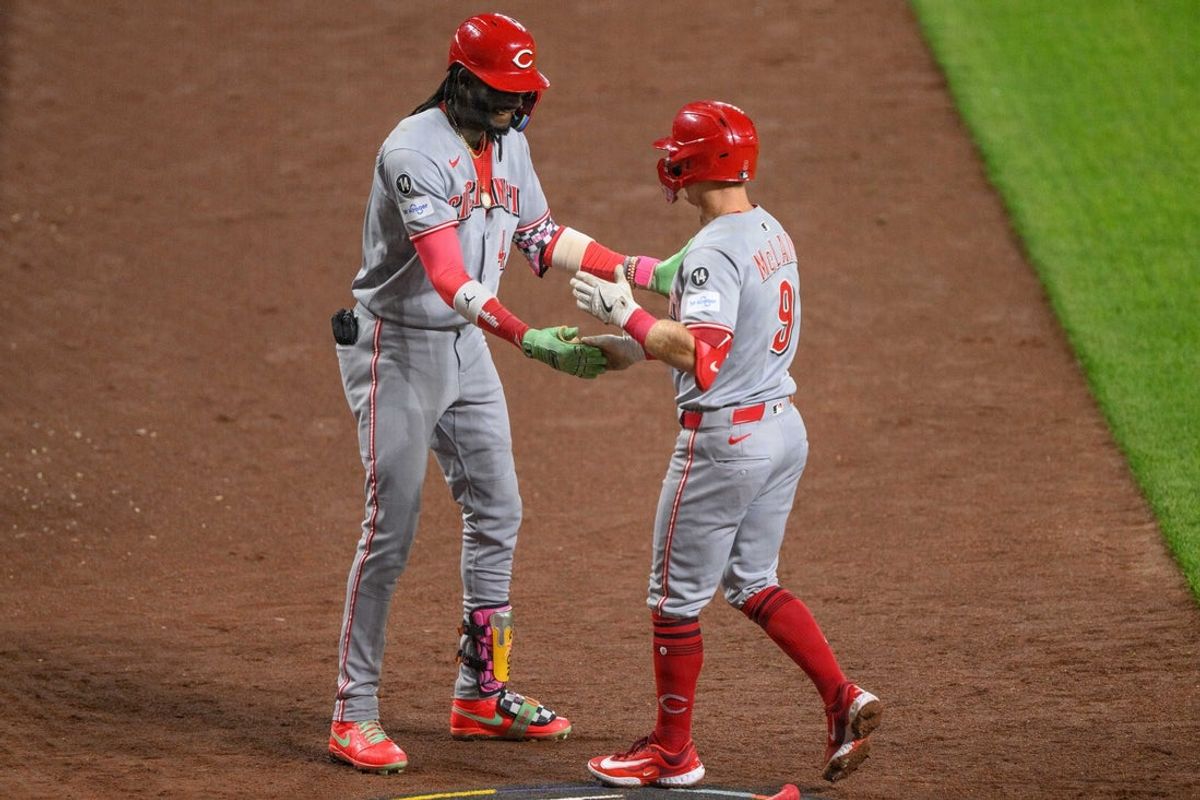 Apr 18, 2025; Baltimore, Maryland, USA; Cincinnati Reds second baseman Matt McLain (9) celebrates after hitting a home run with shortstop Elly De La Cruz (44) during the fourth inning against the Baltimore Orioles at Oriole Park at Camden Yards. Mandatory Credit: Reggie Hildred-Imagn Images