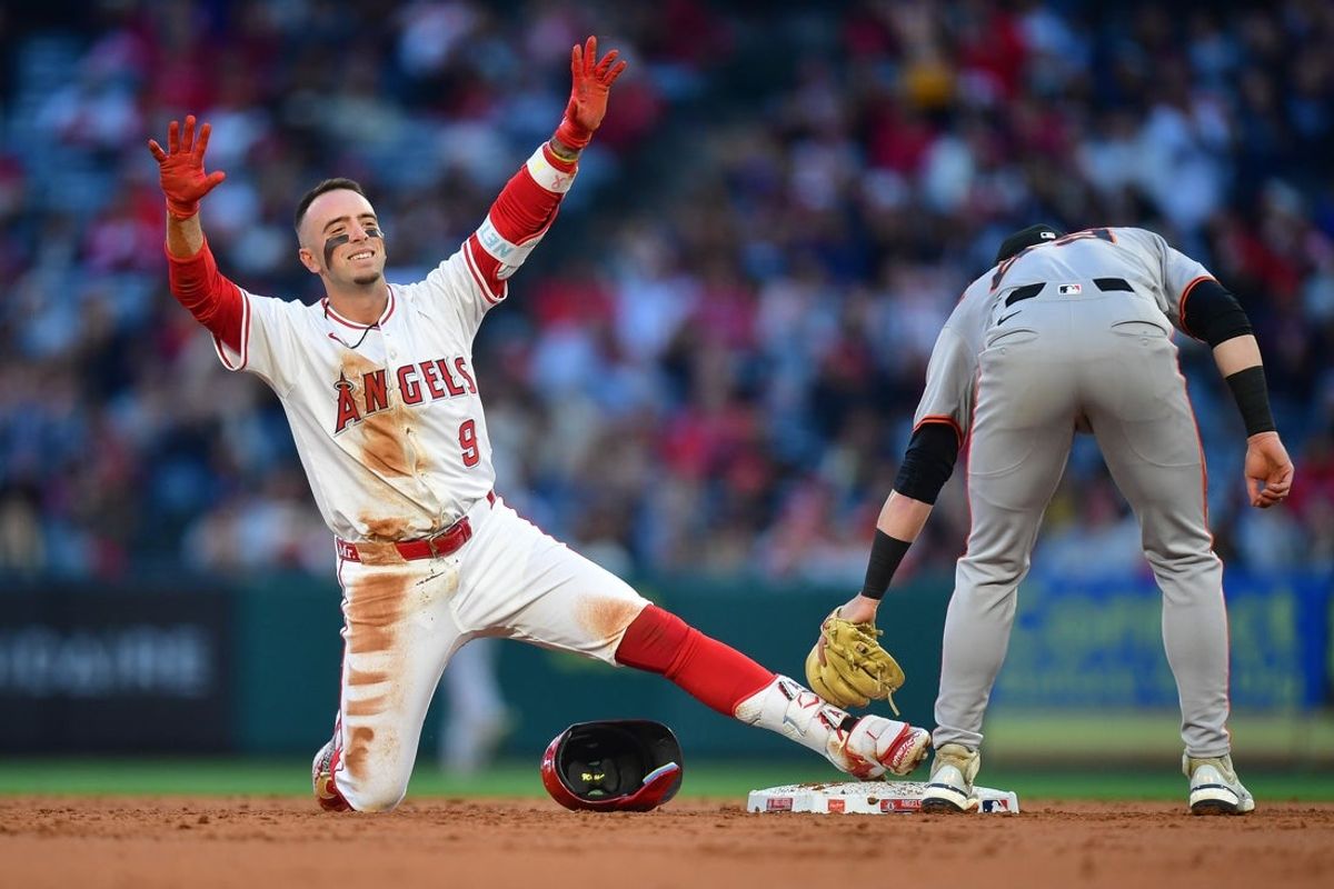 Apr 18, 2025; Anaheim, California, USA; Los Angeles Angels shortstop Zach Neto (9) reaches second on an RBI double against the San Francisco Giants during the second inning at Angel Stadium. Mandatory Credit: Gary A. Vasquez-Imagn Images