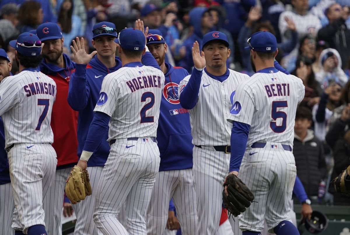 Apr 19, 2025; Chicago, Illinois, USA; The Chicago Cubs celebrate their win against the Arizona Diamondbacks at Wrigley Field. Mandatory Credit: David Banks-Imagn Images