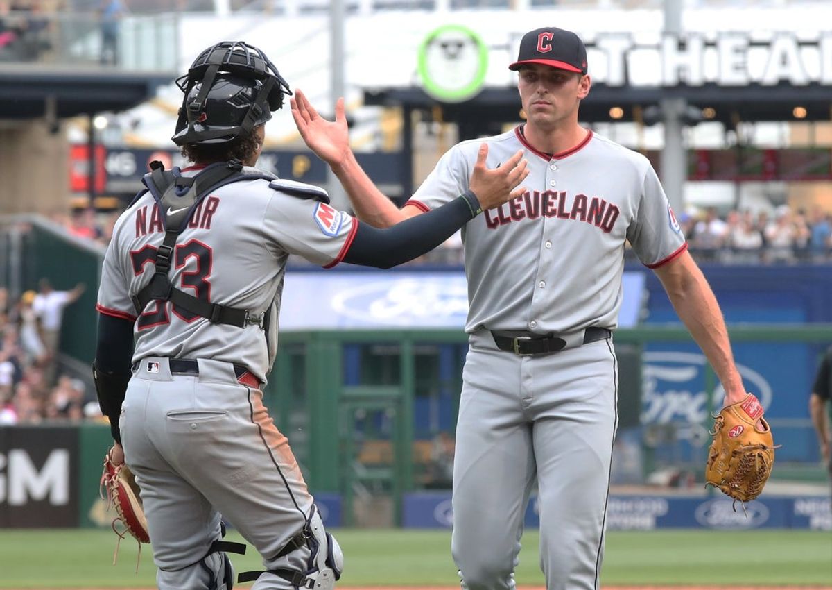 Apr 19, 2025; Pittsburgh, Pennsylvania, USA;  Cleveland Guardians catcher Bo Naylor (23) and relief pitcher Cade Smith (right) react after getting out of a jam against the Pittsburgh Pirates during the sixth inning at PNC Park. Mandatory Credit: Charles LeClaire-Imagn Images