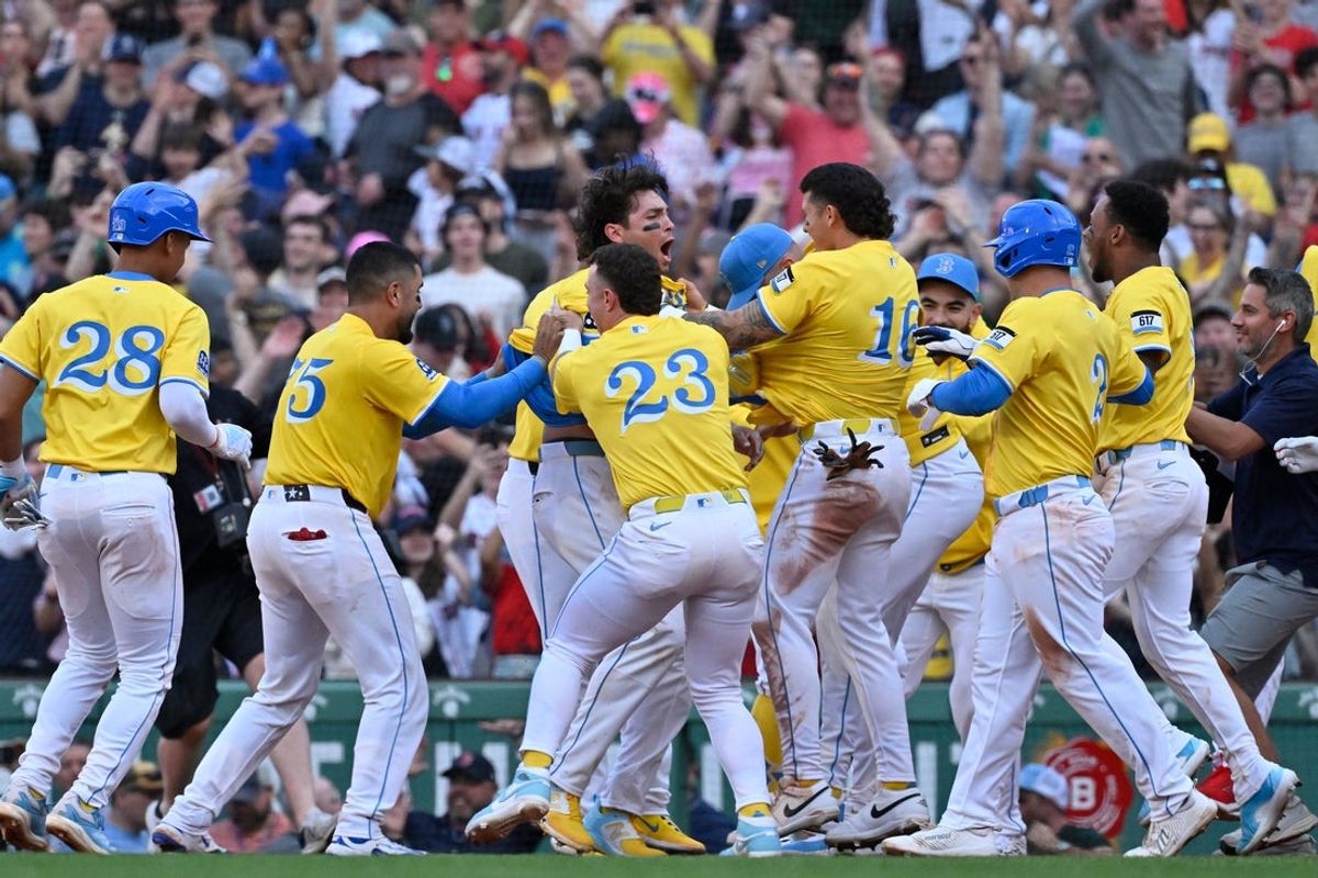 Apr 19, 2025; Boston, Massachusetts, USA; Boston Red Sox first baseman Triston Casas (36) (center) celebrates his game winning RBI against the Chicago White Sox at Fenway Park. Mandatory Credit: Eric Canha-Imagn Images