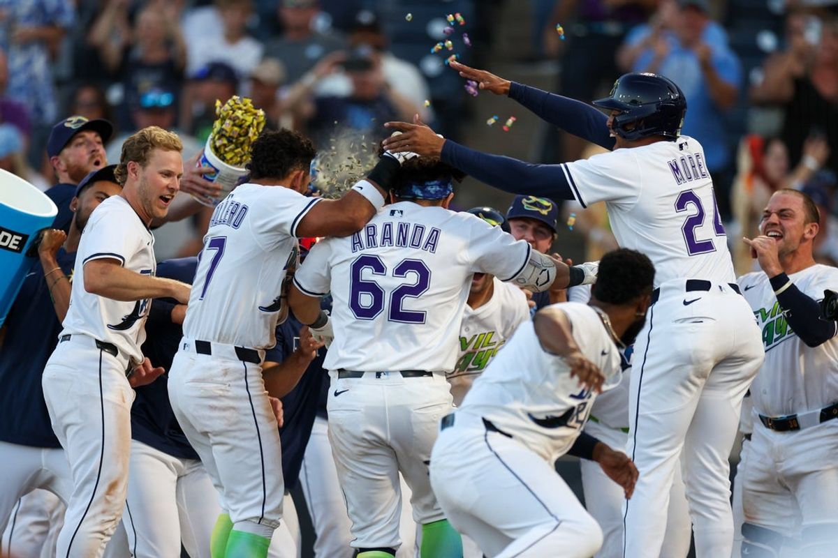 Apr 19, 2025; Tampa, Florida, USA; Tampa Bay Rays first baseman Jonathan Aranda (62) celebrates after hitting a two run walk off home run against the New York Yankees in the tenth inning  at George M. Steinbrenner Field. Mandatory Credit: Nathan Ray Seebeck-Imagn Images