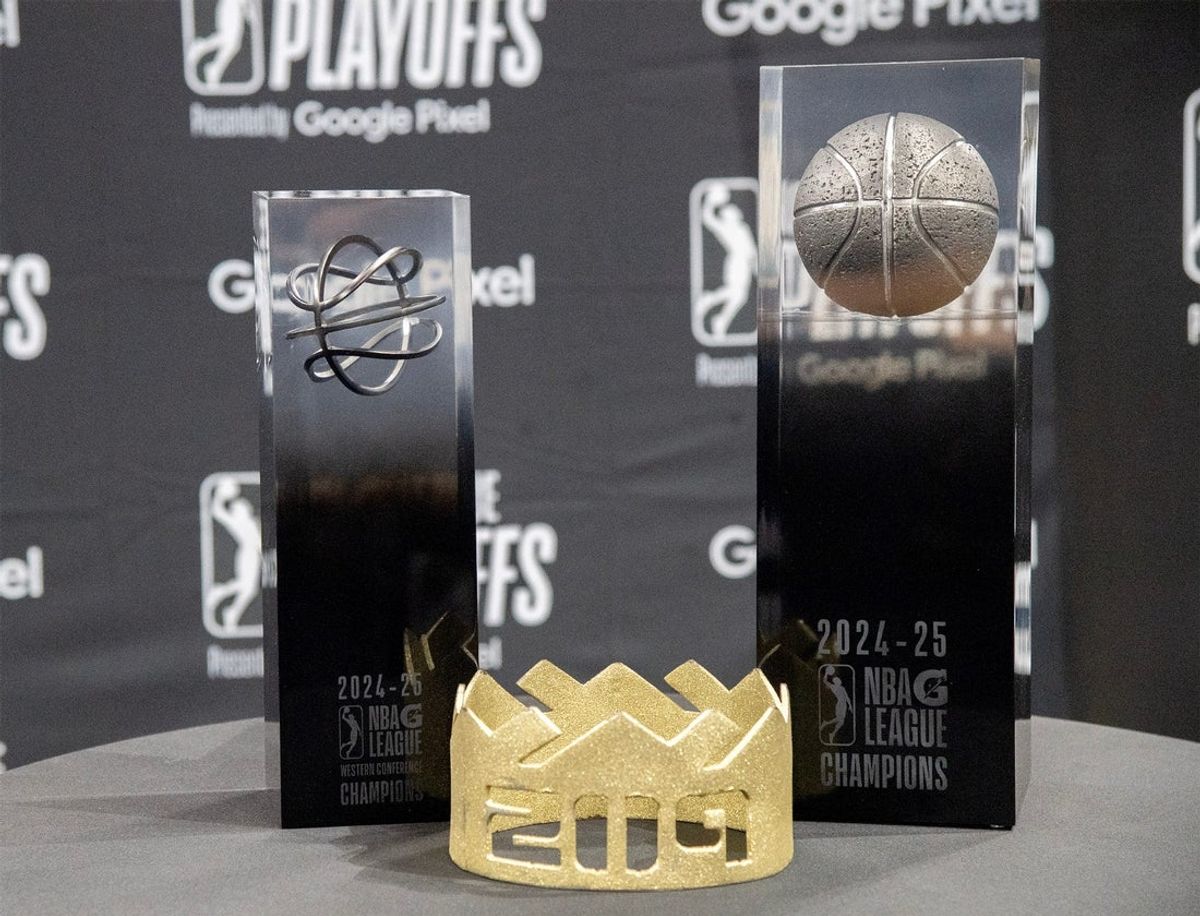 The NBA G League Western Conference, left, and G League Championship trophies were on display at the Adventist Health Arena for a celebration event for the Kings’ win in the NBA G League Championship.