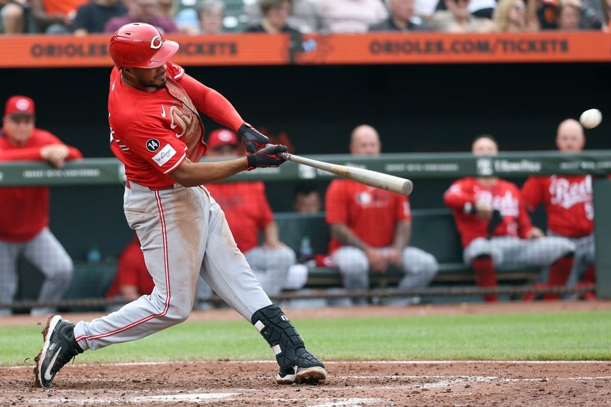 Apr 19, 2025; Baltimore, Maryland, USA; Cincinnati Reds third baseman Jeimer Candelario (3) hits a double during the sixth inning against the Baltimore Orioles at Oriole Park at Camden Yards. Mandatory Credit: Daniel Kucin Jr.-Imagn Images