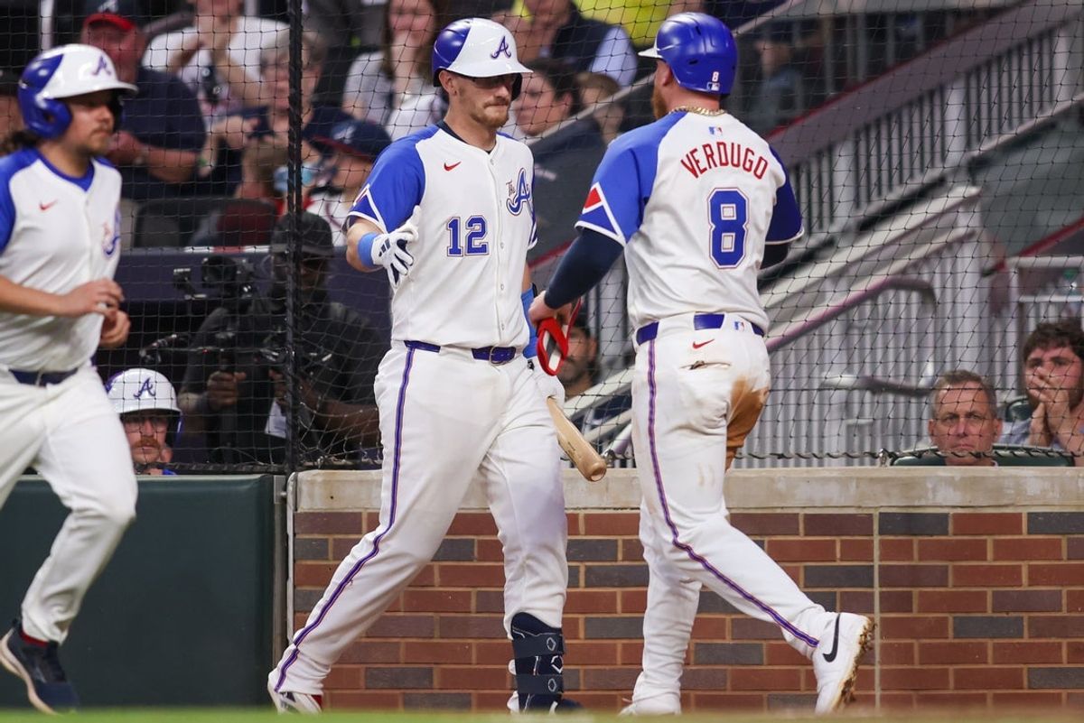 Apr 19, 2025; Atlanta, Georgia, USA; Atlanta Braves left fielder Alex Verdugo (8) celebrates after scoring with catcher Sean Murphy (12) against the Minnesota Twins in the third inning at Truist Park. Mandatory Credit: Brett Davis-Imagn Images