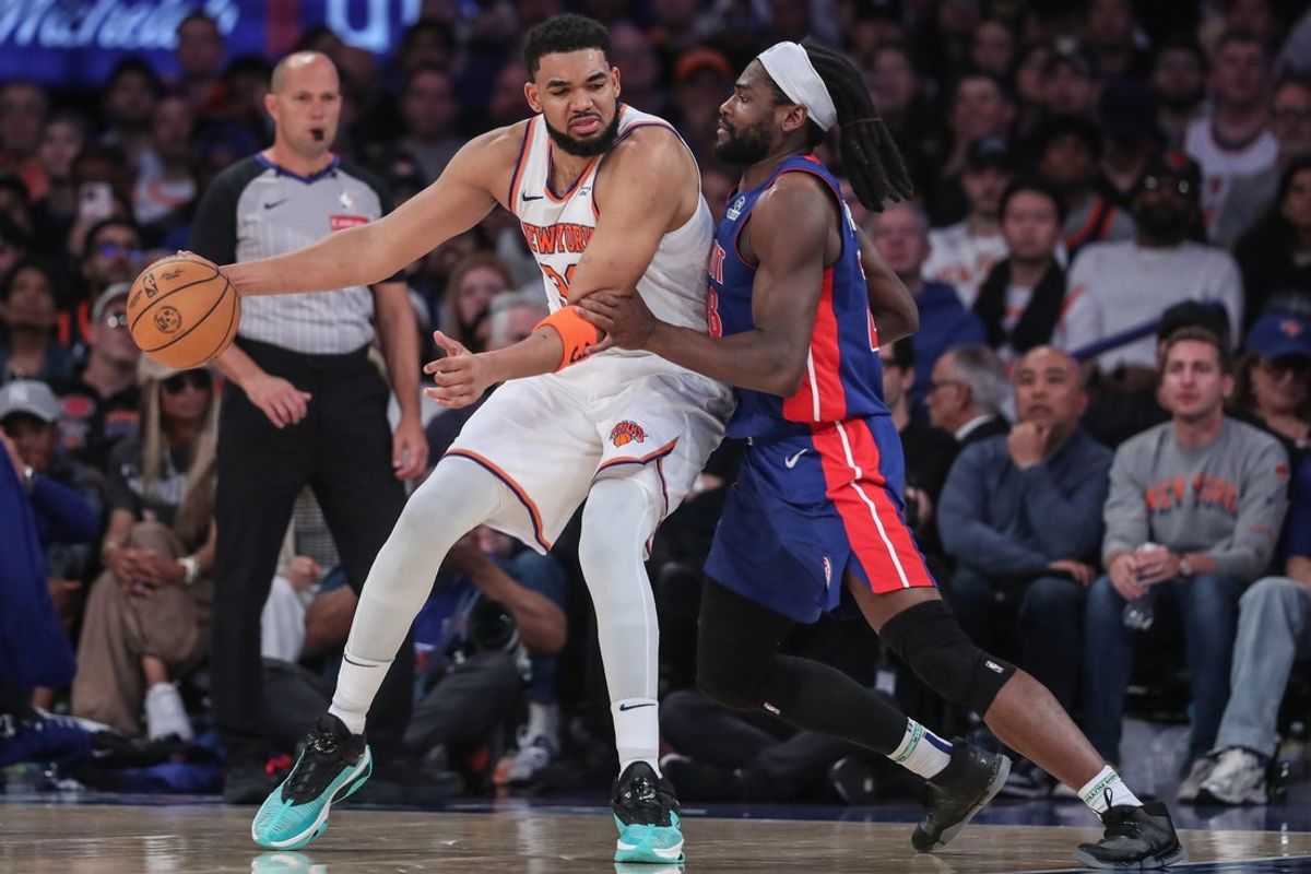 Apr 19, 2025; New York, New York, USA; New York Knicks center Karl-Anthony Towns (32) looks to post up on Detroit Pistons center Isaiah Stewart (28) in Game One of the First Round of the NBA Playoffs at Madison Square Garden. Mandatory Credit: Wendell Cruz-Imagn Images